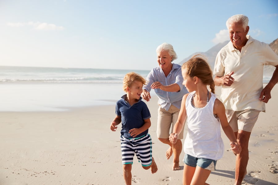 Picture of family running on the beach