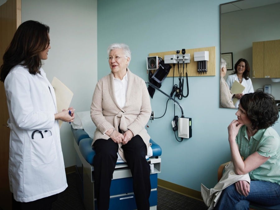 Woman focusing on person that is speaking with her